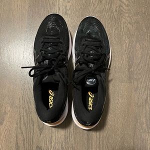 ASICS Gel-Cumulus 23 woman’s running shoes in Black/Sun Peach size 11b.